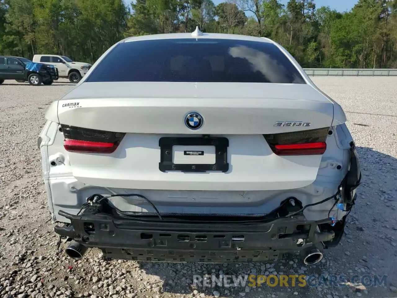 6 Photograph of a damaged car 3MW5P7J03N8C66082 BMW 3 SERIES 2022