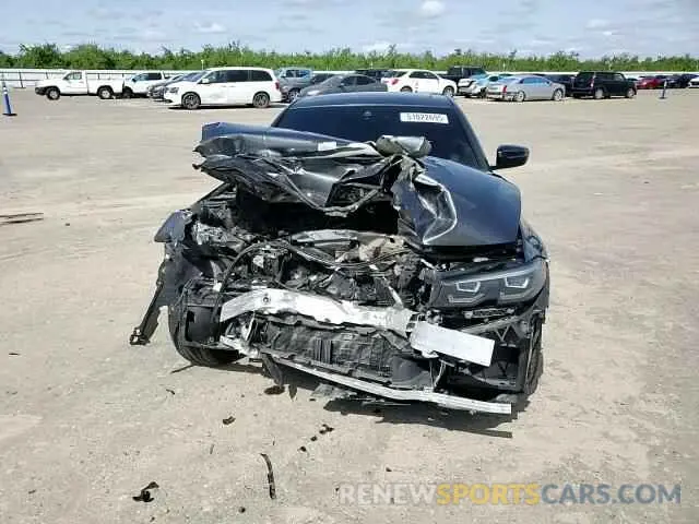 11 Photograph of a damaged car 3MW5R1J04N8C70617 BMW 3 SERIES 2022