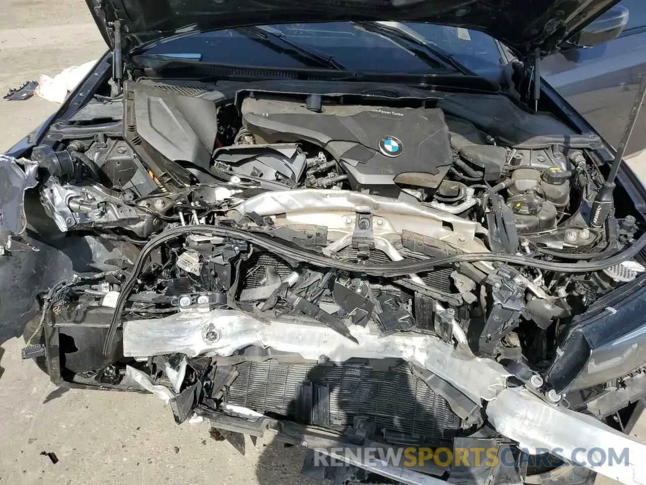 12 Photograph of a damaged car 3MW5R1J04N8C70617 BMW 3 SERIES 2022
