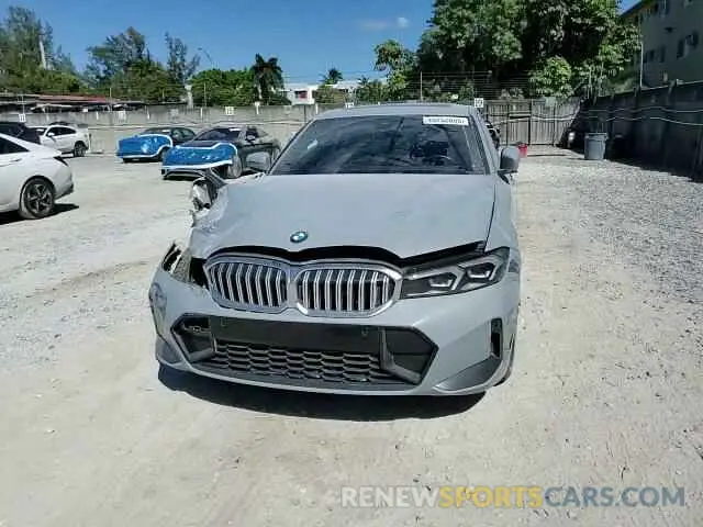 11 Фотография поврежденного автомобиля 3MW69FF07P8C92236 BMW 3 SERIES 2023