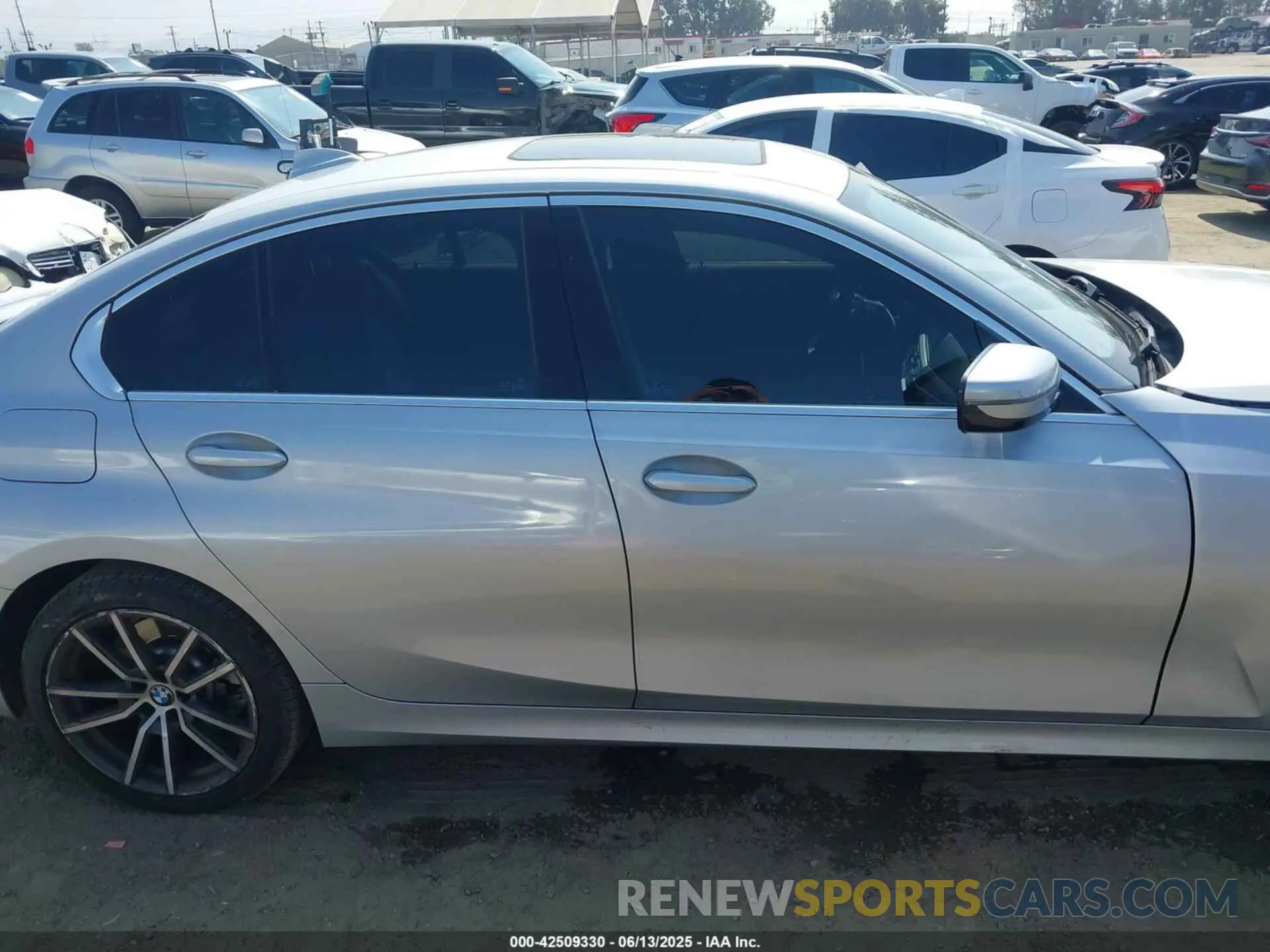 13 Photograph of a damaged car WBA5R1C50KAK12383 BMW 330I 2019