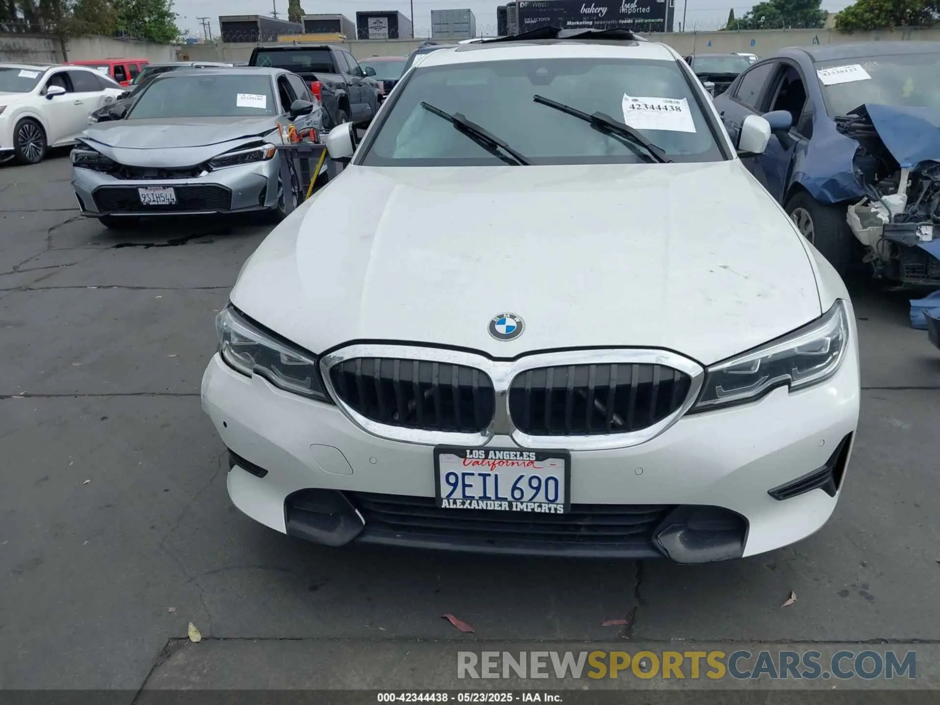 12 Photograph of a damaged car WBA5R1C56KFH28592 BMW 330I 2019