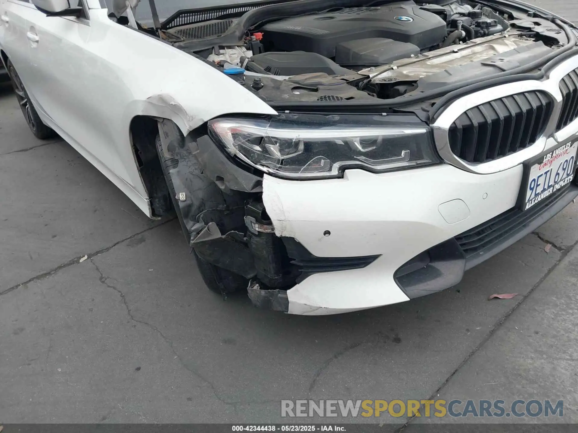18 Photograph of a damaged car WBA5R1C56KFH28592 BMW 330I 2019