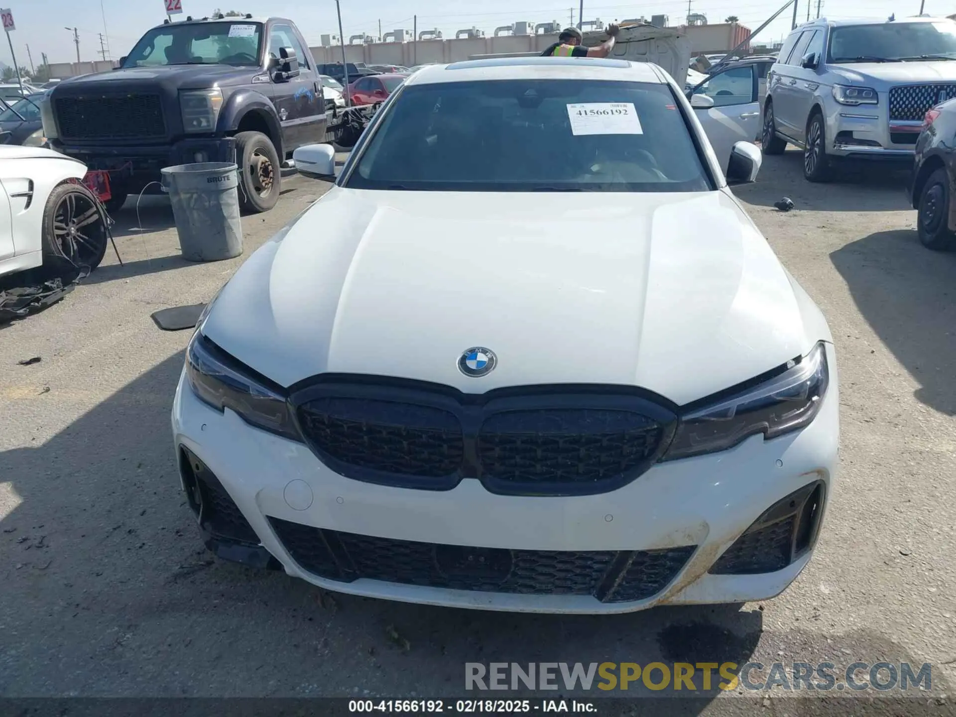 11 Photograph of a damaged car WBA5R1C59KAJ99746 BMW 330I 2019