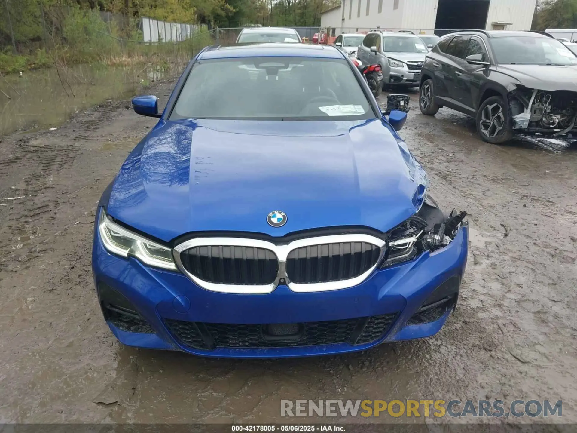 12 Photograph of a damaged car WBA5R7C55KAE82585 BMW 330I 2019