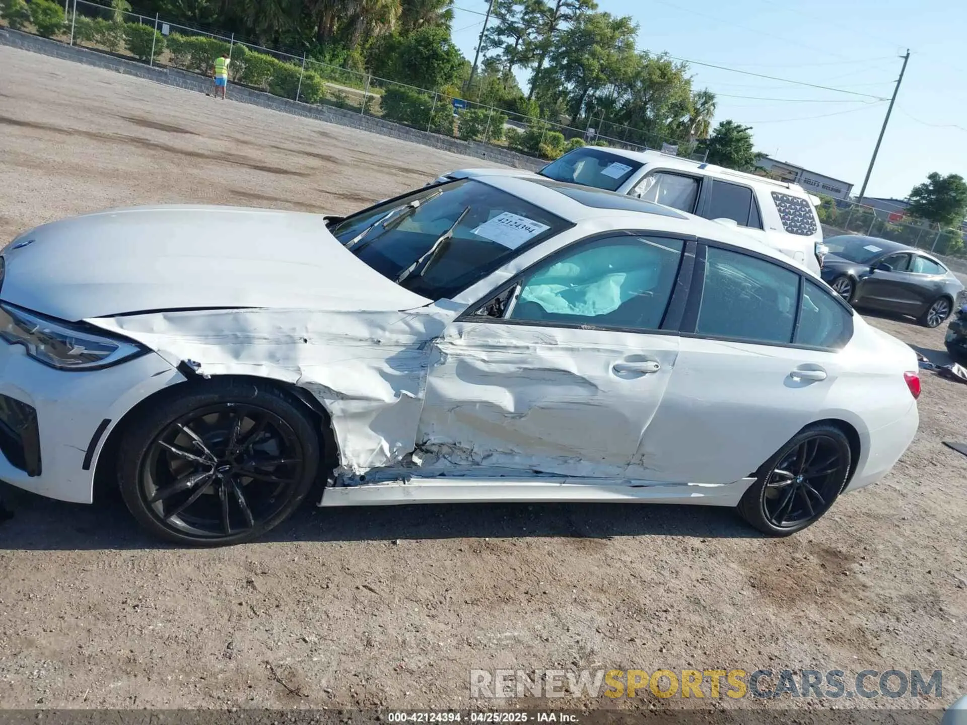 14 Photograph of a damaged car 3MW5R1J04L8B29799 BMW 330I 2020