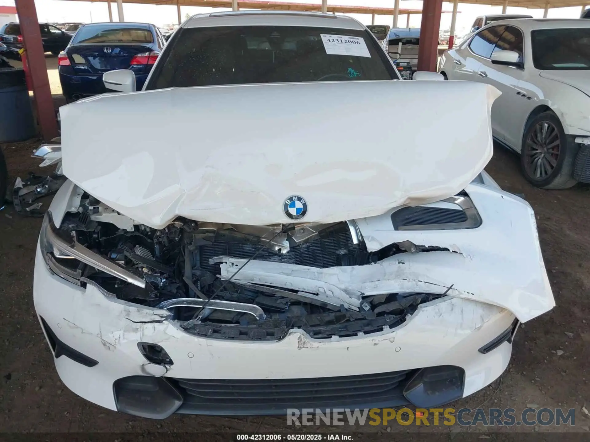 12 Photograph of a damaged car 3MW5R1J01N8C47893 BMW 330I 2022