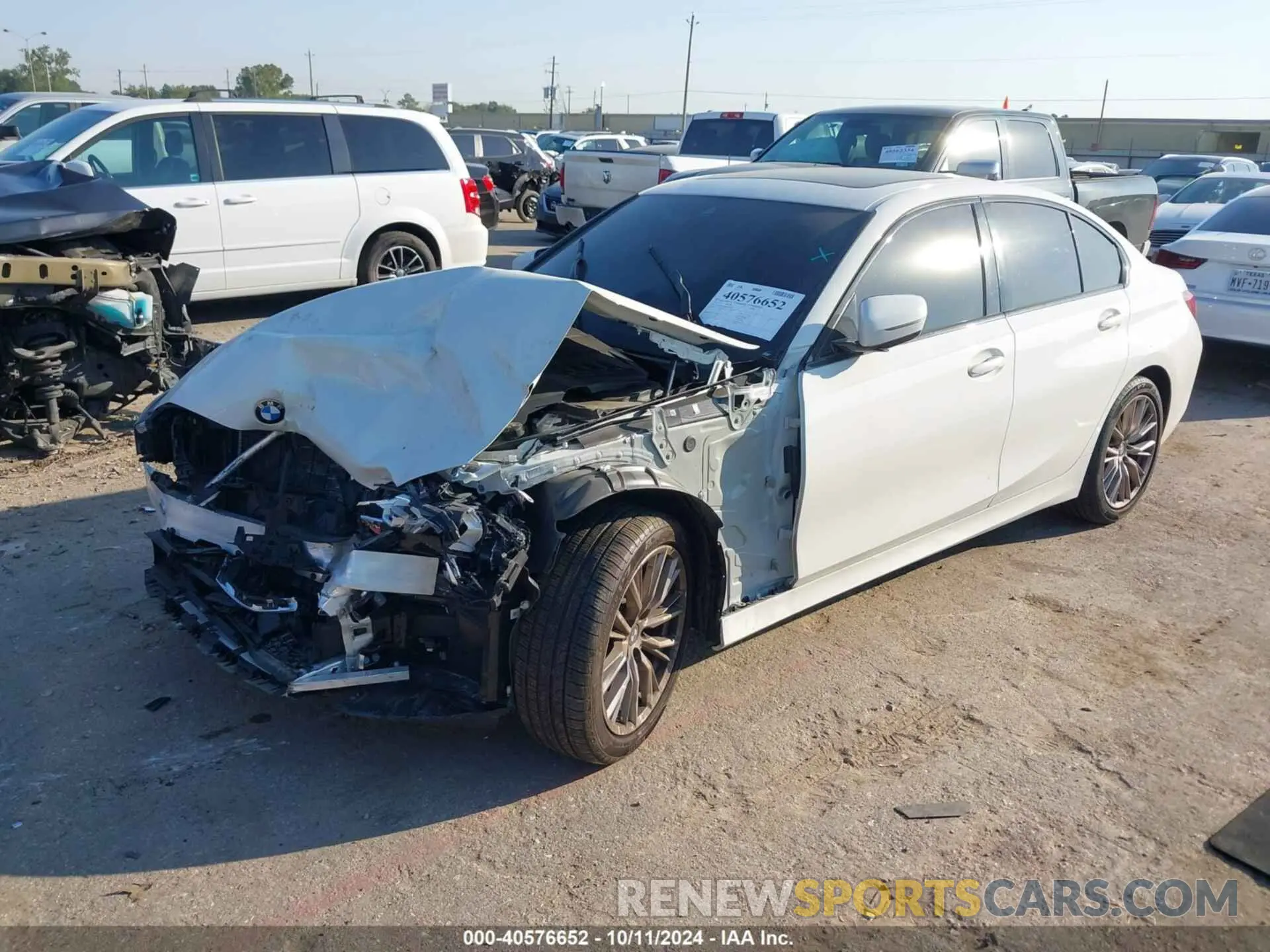 2 Photograph of a damaged car 3MW69FF07P8D46845 BMW 330I 2023