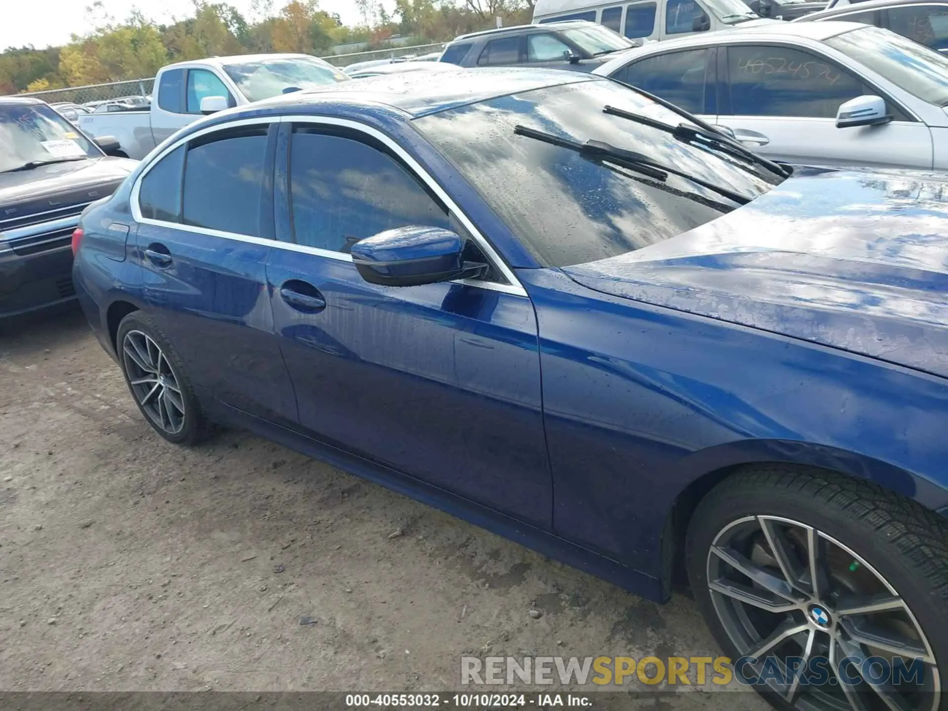 14 Photograph of a damaged car WBA5R7C52KAJ80183 BMW 330XI 2019
