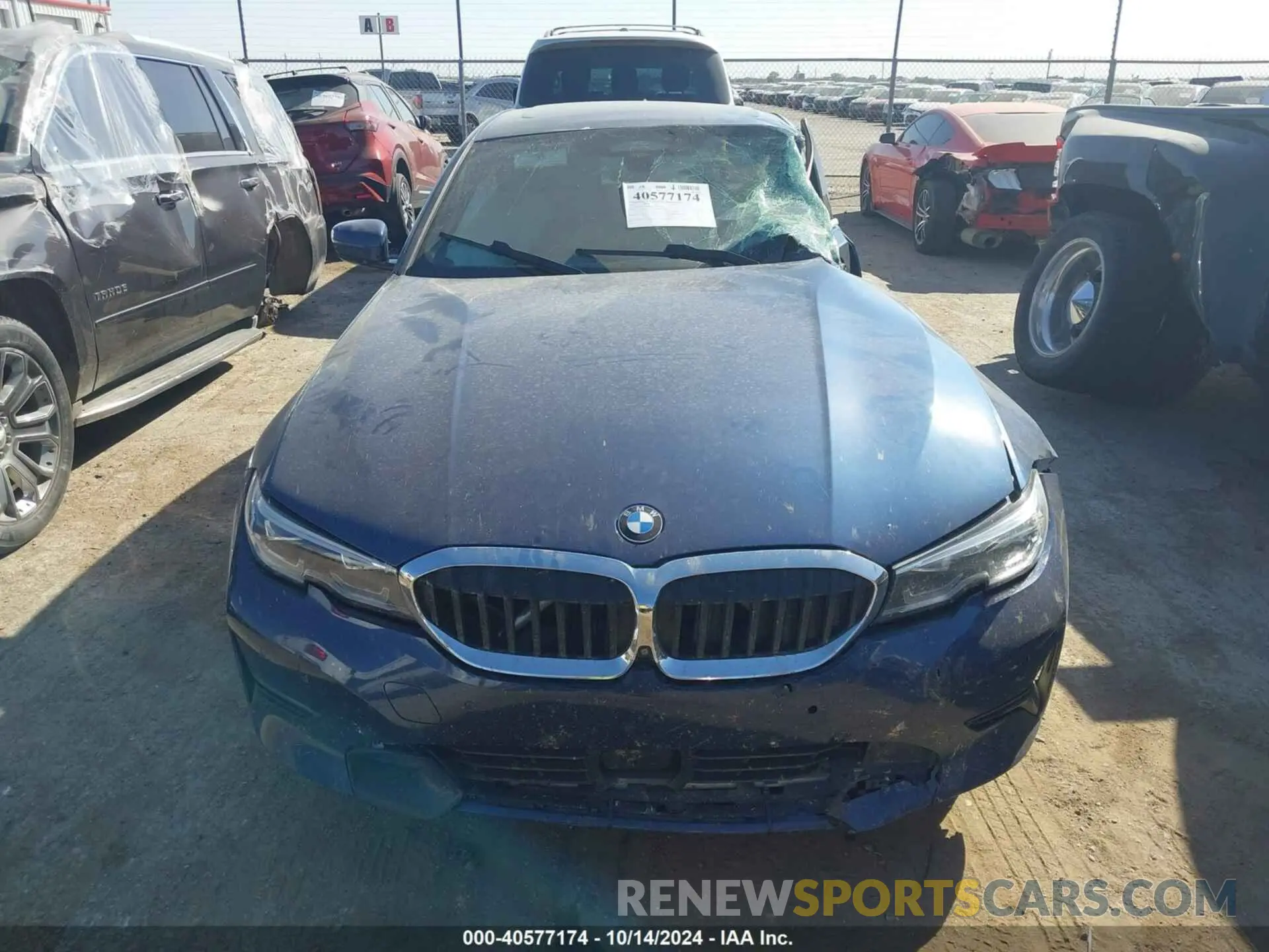 12 Photograph of a damaged car 3MW5R7J08M8B89444 BMW 330XI 2021