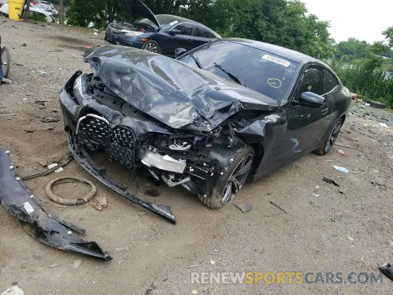 2 Photograph of a damaged car WBA73AP00NCJ02175 BMW 4 SERIES 2022