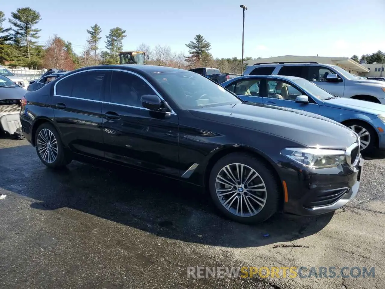 4 Photograph of a damaged car WBAJA7C54KWW23037 BMW 5 SERIES 2019