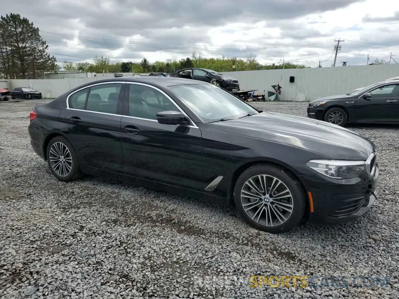 4 Photograph of a damaged car WBAJA7C59KWW18612 BMW 5 SERIES 2019