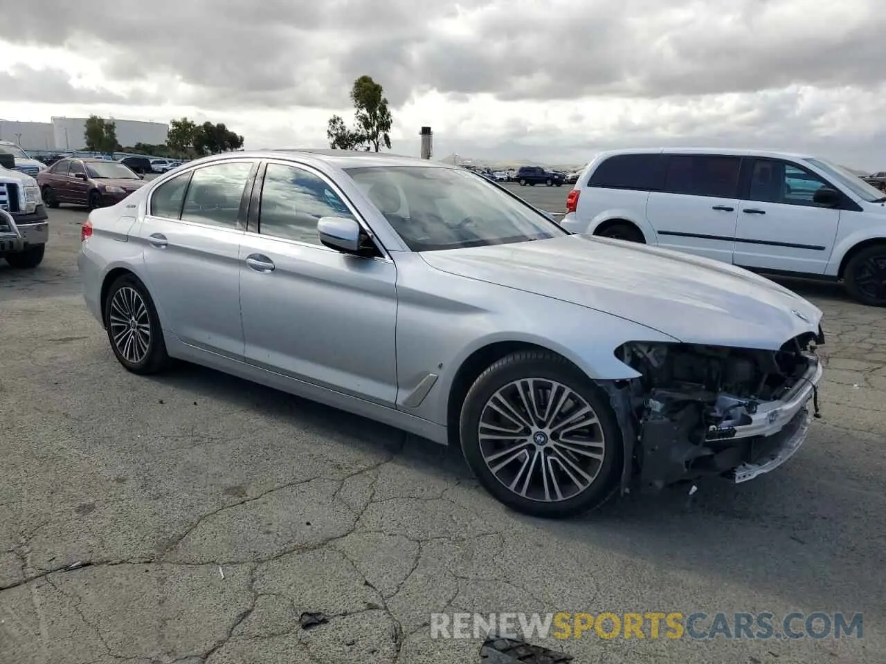 4 Photograph of a damaged car WBAJA9C51KB391807 BMW 5 SERIES 2019