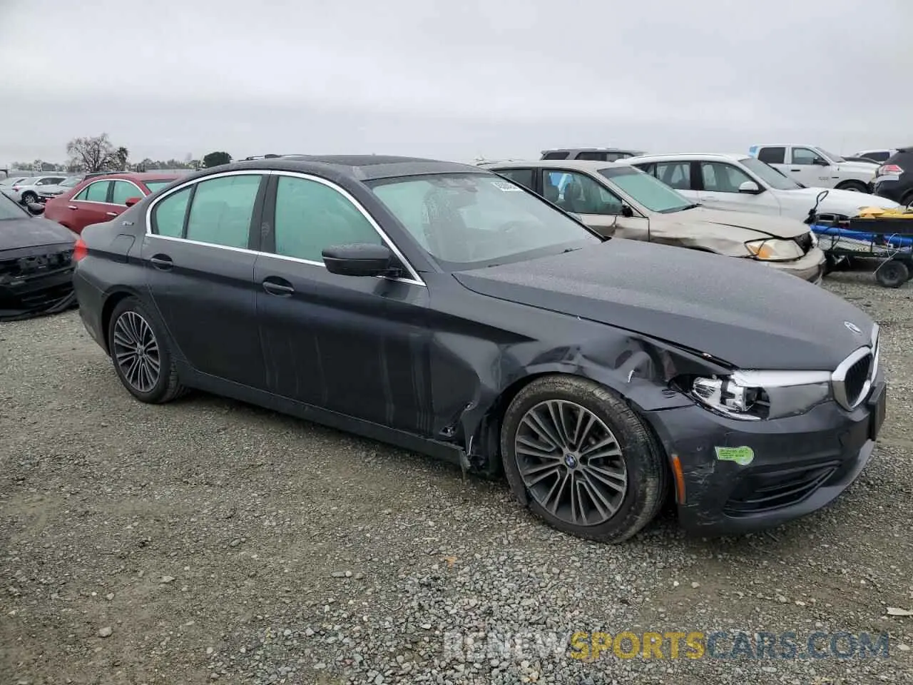 4 Photograph of a damaged car WBAJA9C51KB398689 BMW 5 SERIES 2019