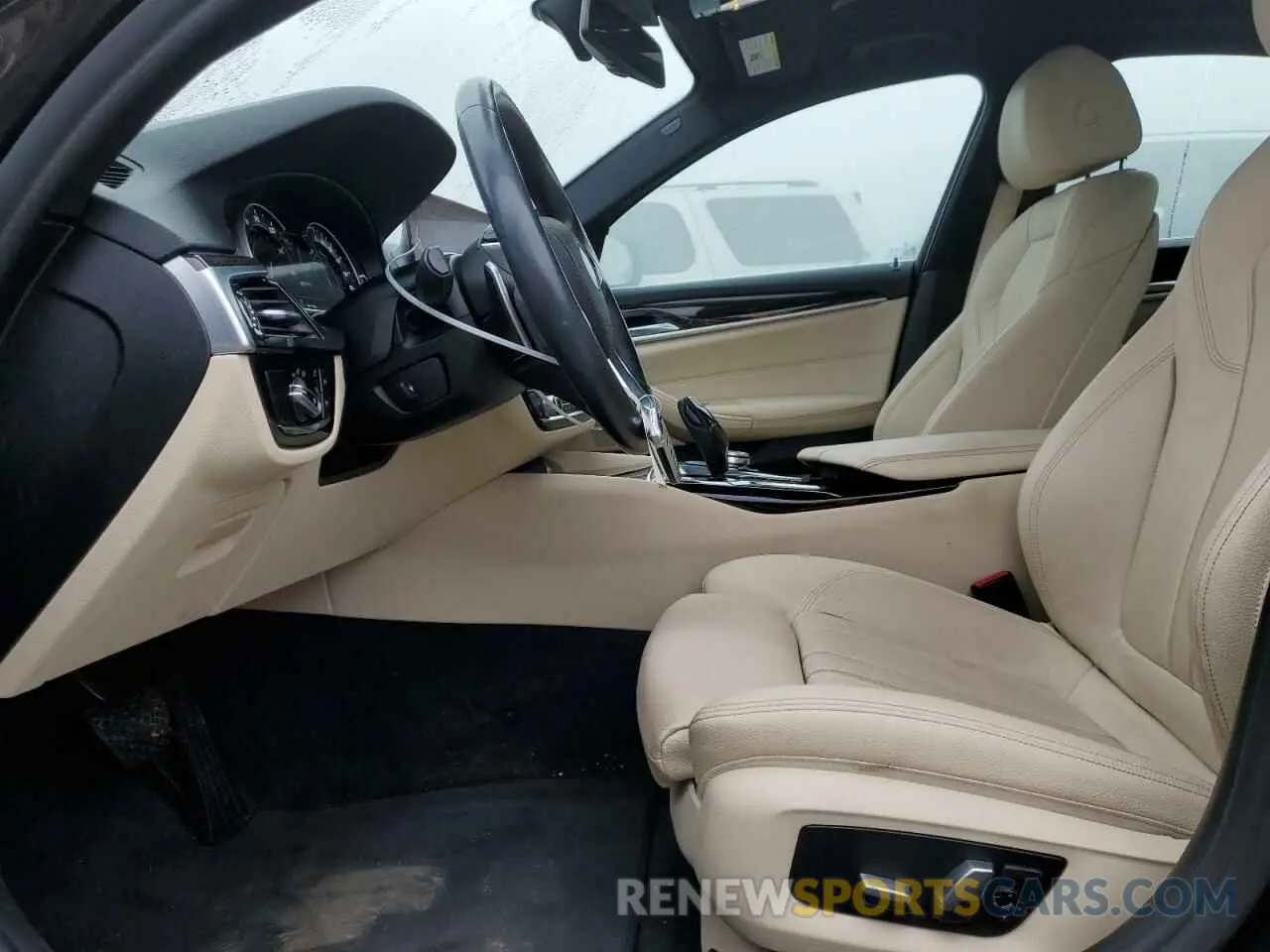 7 Photograph of a damaged car WBAJA9C51KB398689 BMW 5 SERIES 2019