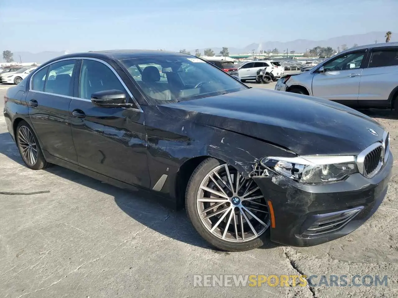 4 Photograph of a damaged car WBAJA9C54KB389470 BMW 5 SERIES 2019