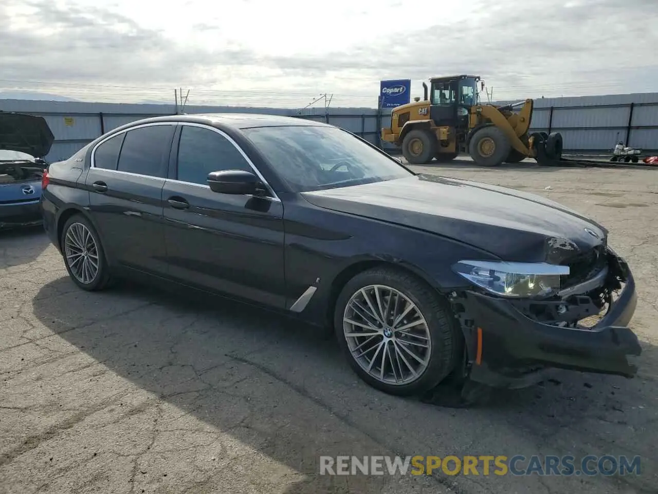 4 Photograph of a damaged car WBAJA9C57KB254712 BMW 5 SERIES 2019