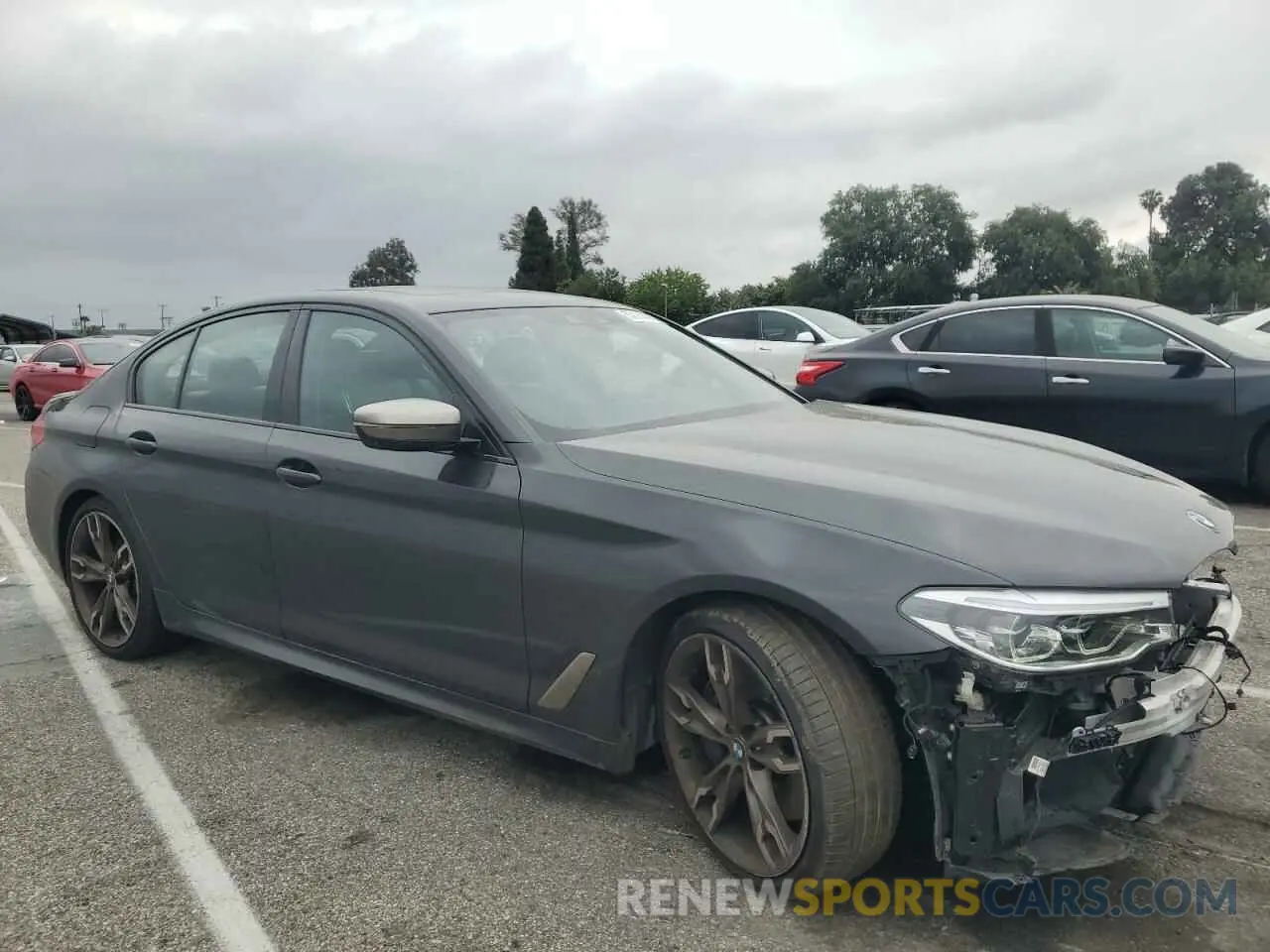 4 Photograph of a damaged car WBAJB9C59KB288809 BMW 5 SERIES 2019
