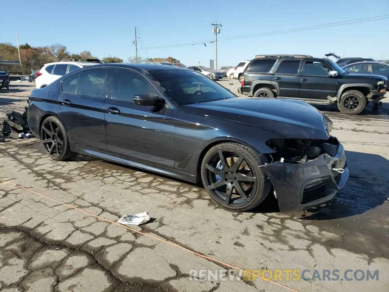 4 Photograph of a damaged car WBAJE5C5XKWW11581 BMW 5 SERIES 2019