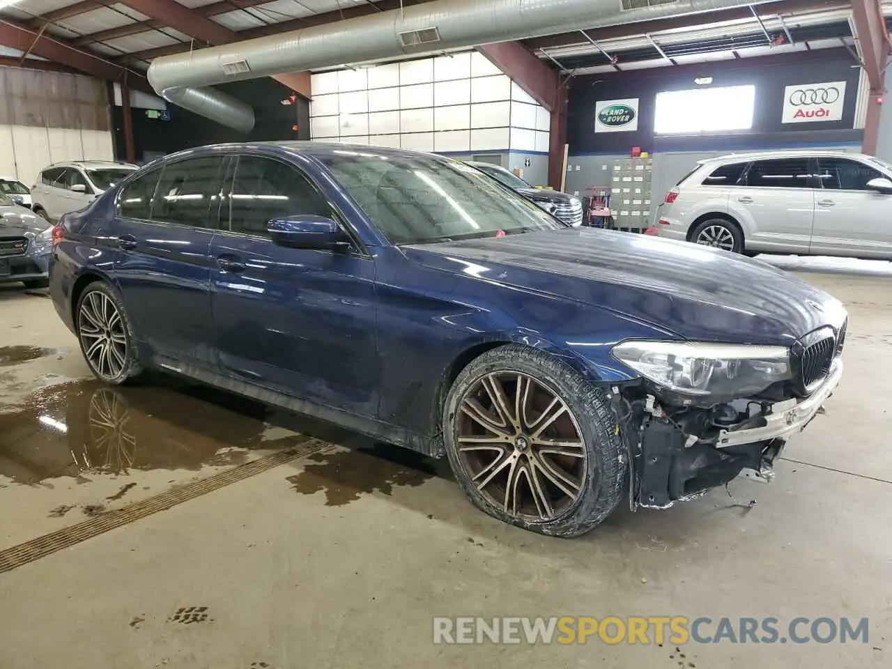 4 Photograph of a damaged car WBAJE7C56KWW18992 BMW 5 SERIES 2019
