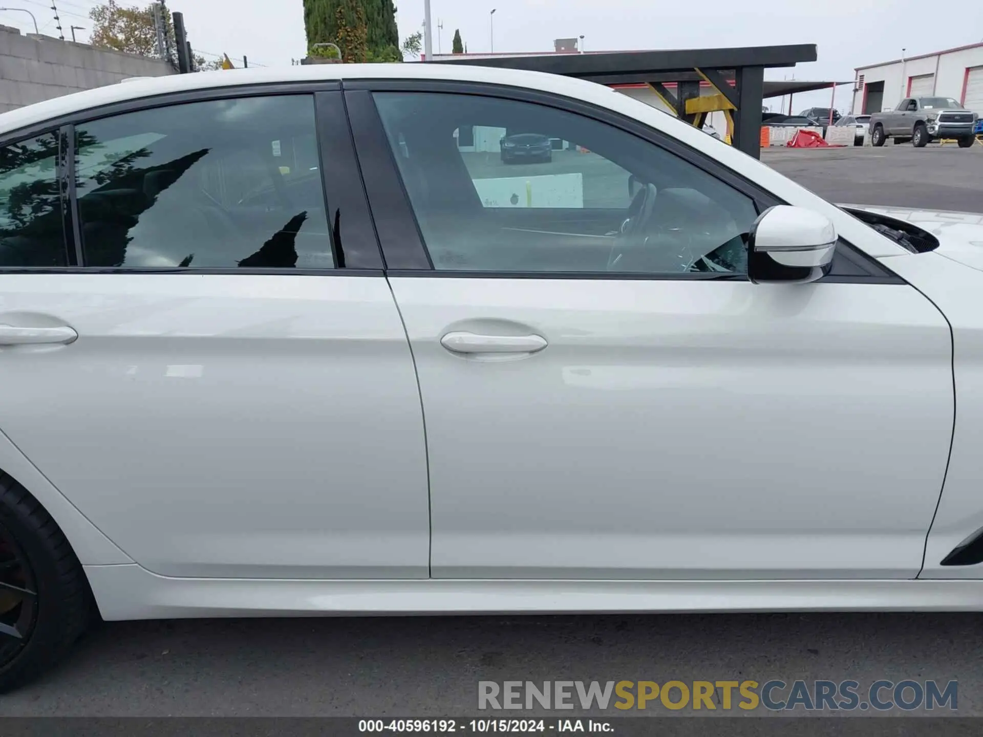 14 Photograph of a damaged car WBA53BH09PCM46263 BMW 530 2023