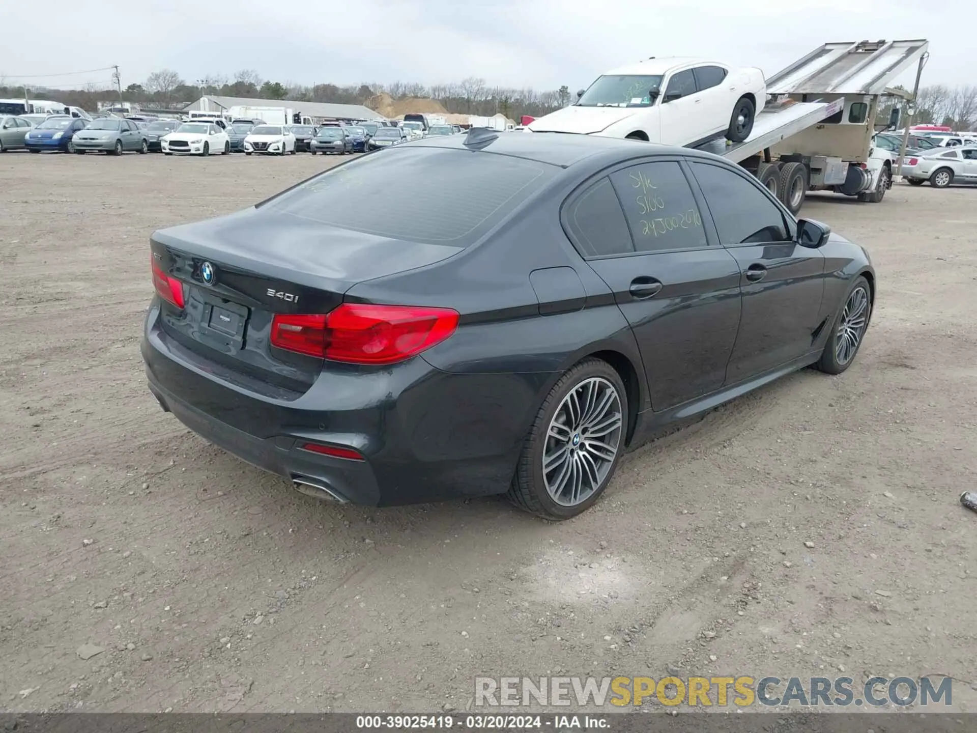 4 Photograph of a damaged car WBAJE7C56KWW14134 BMW 540I 2019