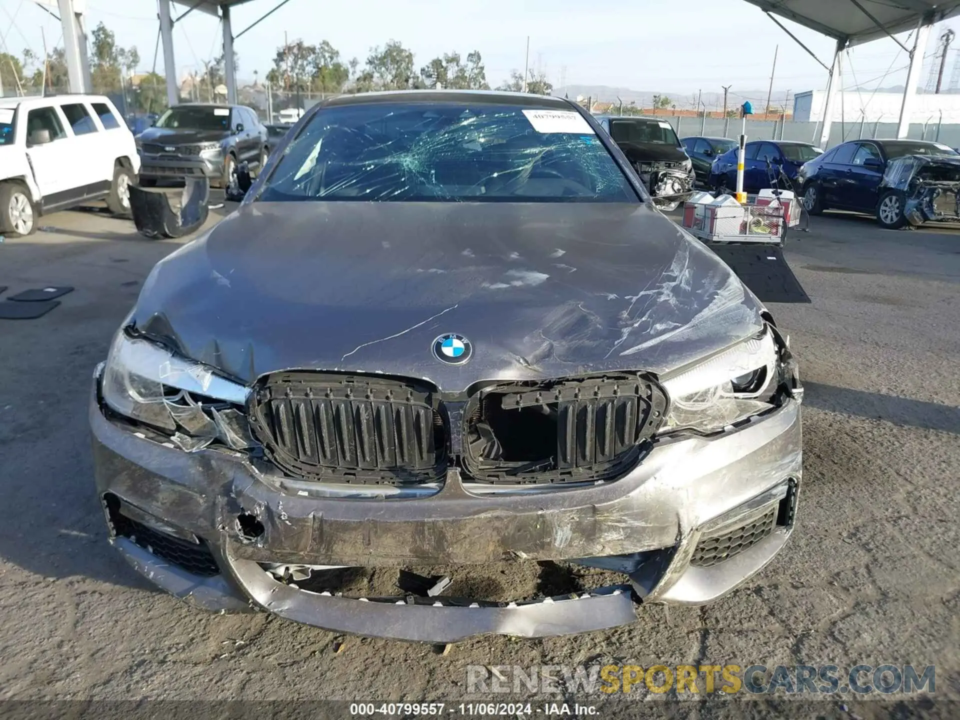 12 Photograph of a damaged car WBAJS1C06LCD26520 BMW 540I 2020