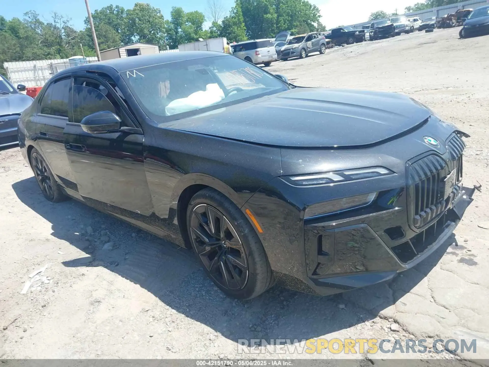 1 Photograph of a damaged car WBA23EH01PCN58267 BMW 740 2023