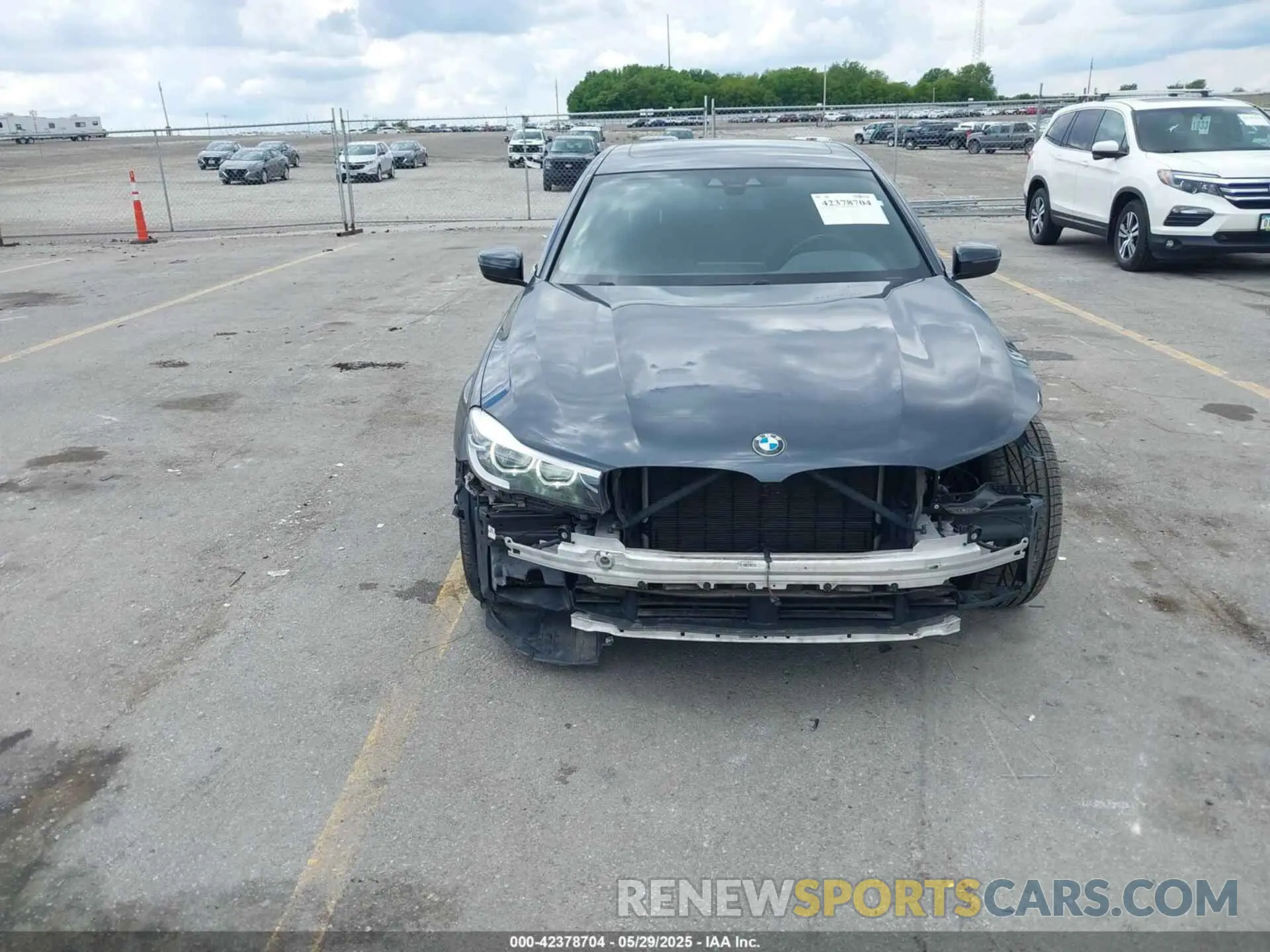 6 Фотография поврежденного автомобиля WBA7E2C57KB217844 BMW 740I 2019