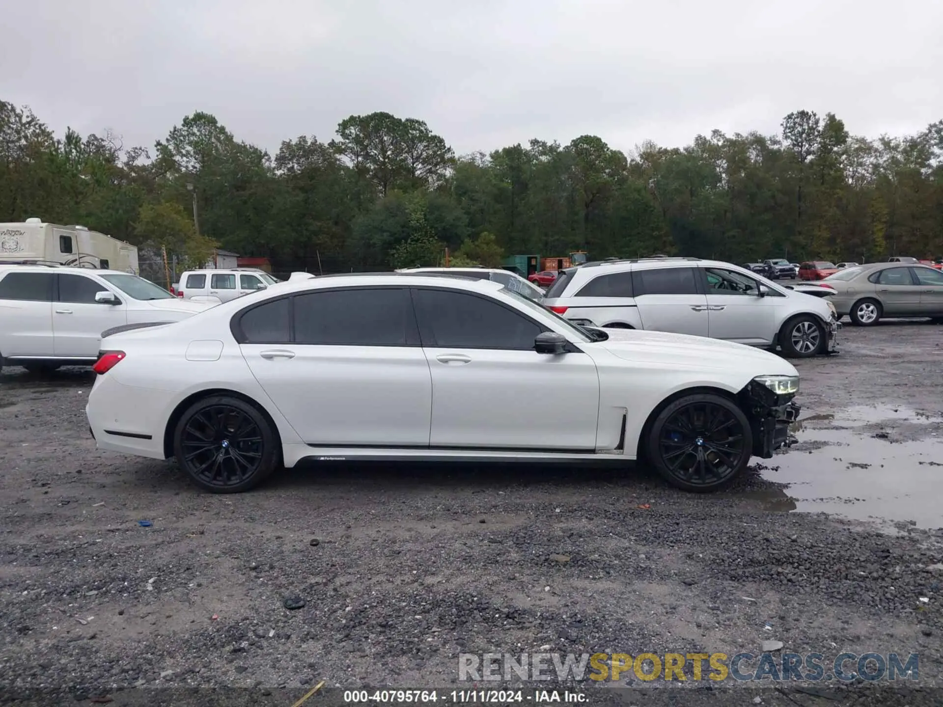 14 Фотография поврежденного автомобиля WBA7U2C09LGM27356 BMW 750I 2020