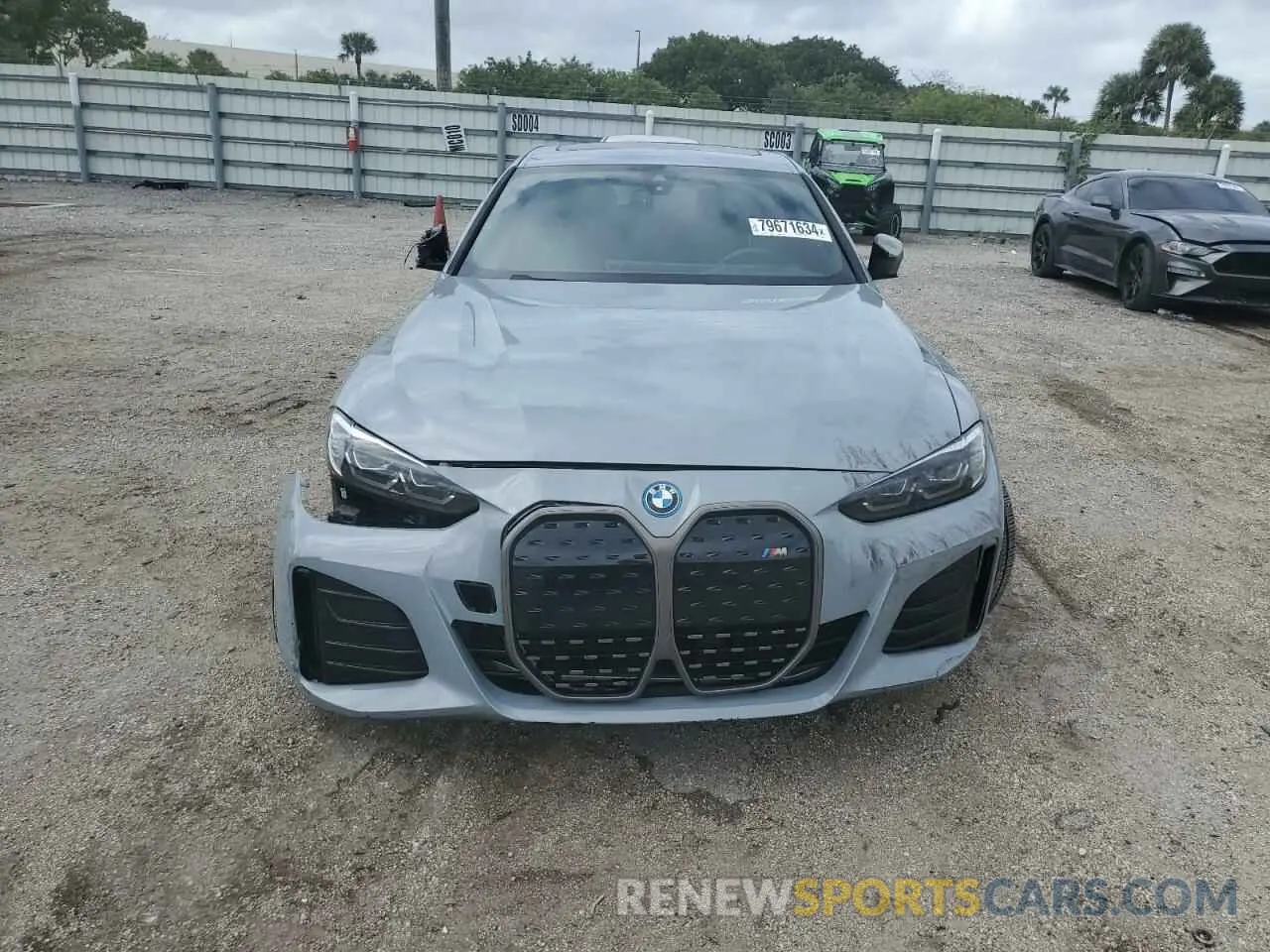 5 Photograph of a damaged car WBY33AW06NFM50076 BMW I4 M50 2022