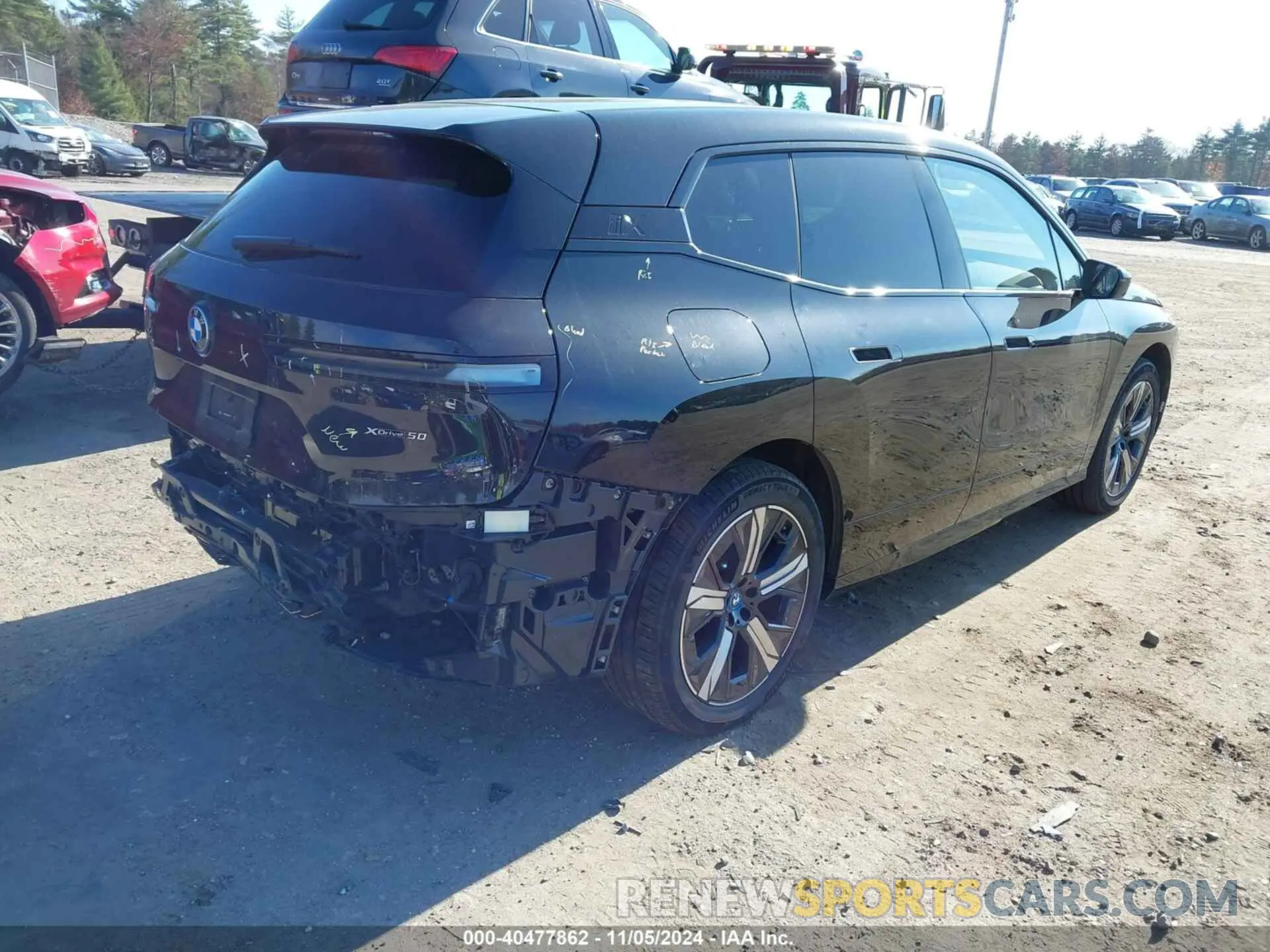 4 Photograph of a damaged car WB523CF09RCR29782 BMW IX 2024