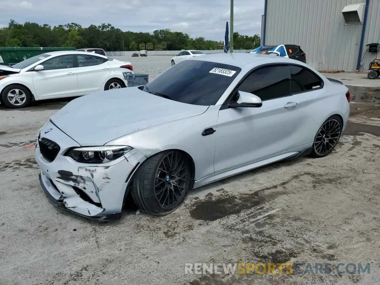 1 Photograph of a damaged car WBS2U7C54K7D32476 BMW M2 2019