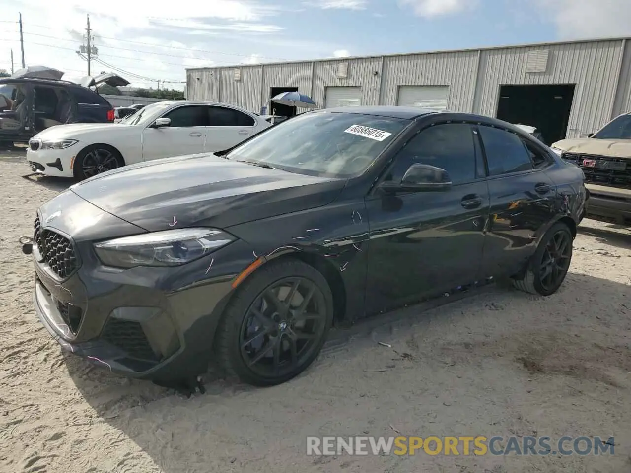 1 Photograph of a damaged car WBA13AL02L7G22964 BMW M2 2020