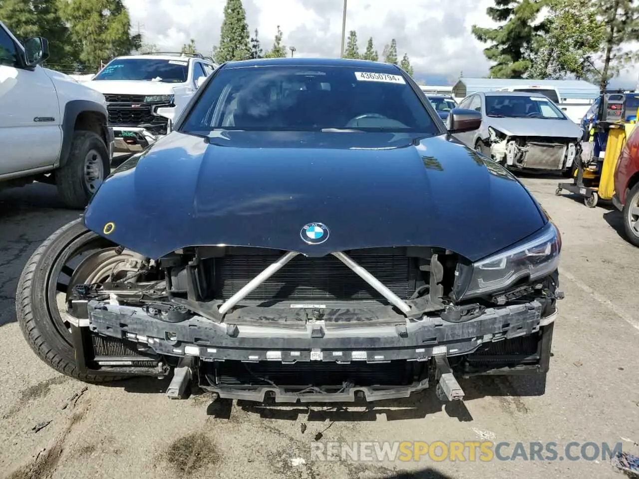 5 Photograph of a damaged car 3MW5U7J02L8B34193 BMW M3 2020