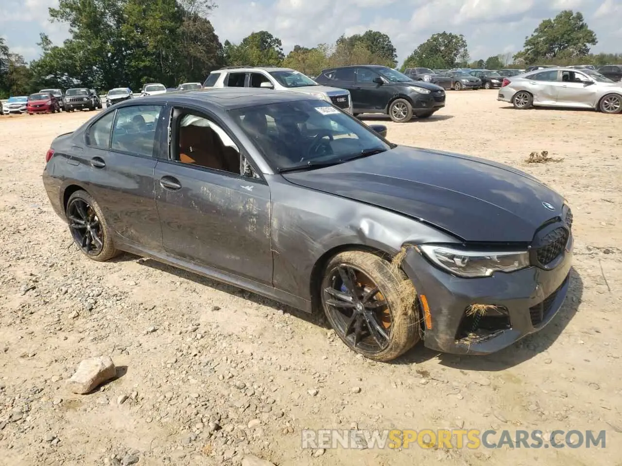4 Photograph of a damaged car WBA5U9C06MFK07213 BMW M3 2021