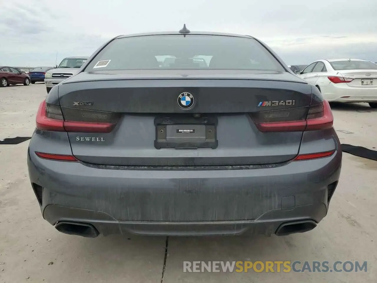 6 Photograph of a damaged car 3MW5U9J07N8C42470 BMW M3 2022