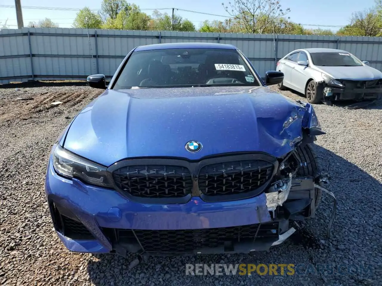 5 Photograph of a damaged car 3MW5U9J09N8C33902 BMW M3 2022