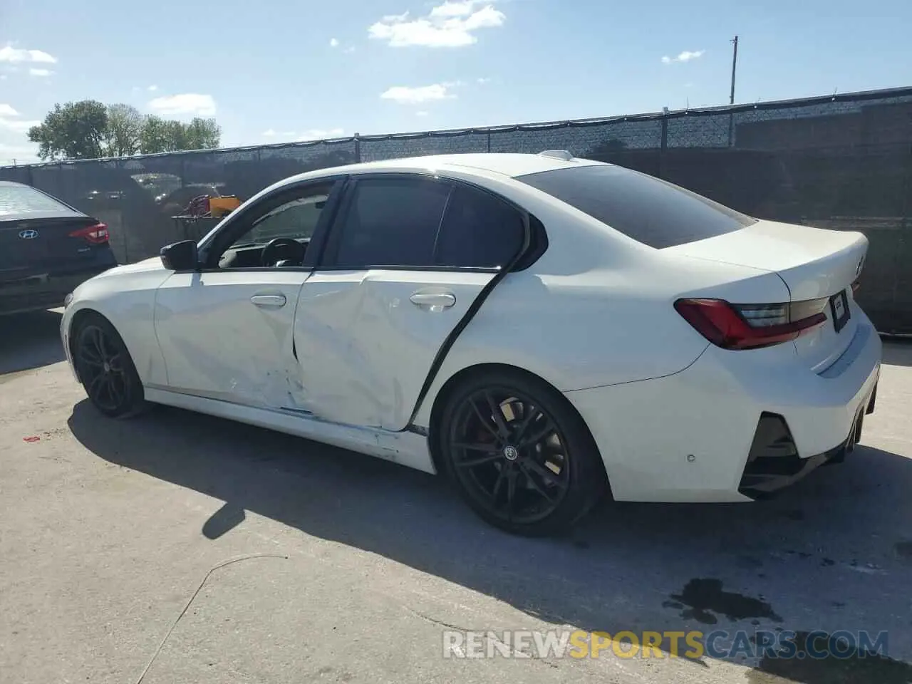 2 Photograph of a damaged car 3MW49FS06P8D13770 BMW M3 2023
