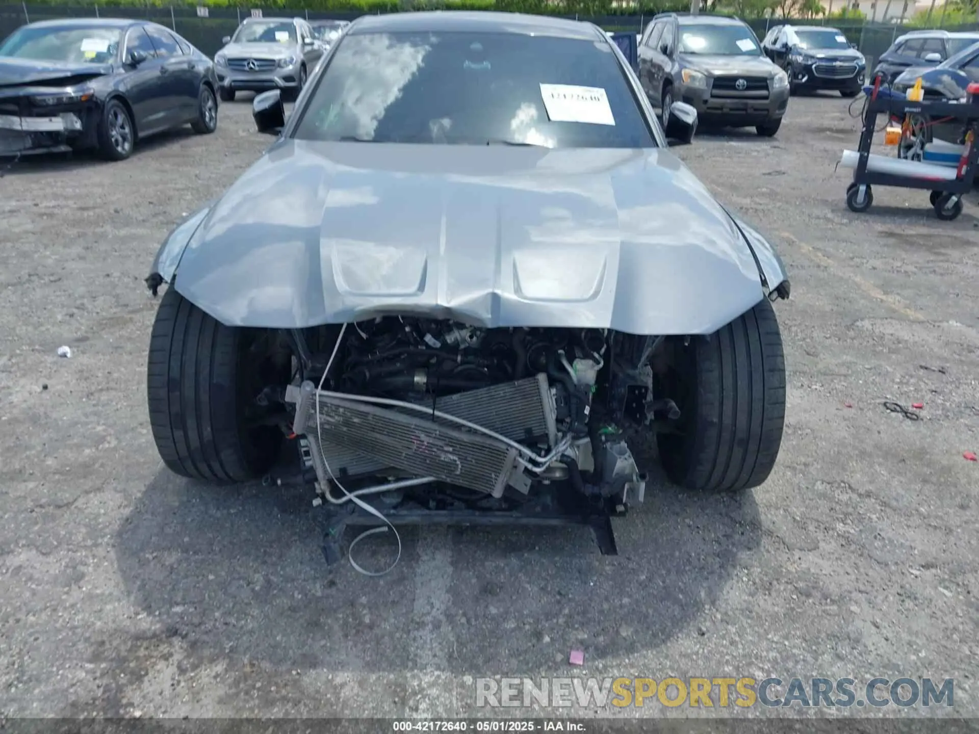 19 Photograph of a damaged car WBS33AY01PFP51123 BMW M3 2023