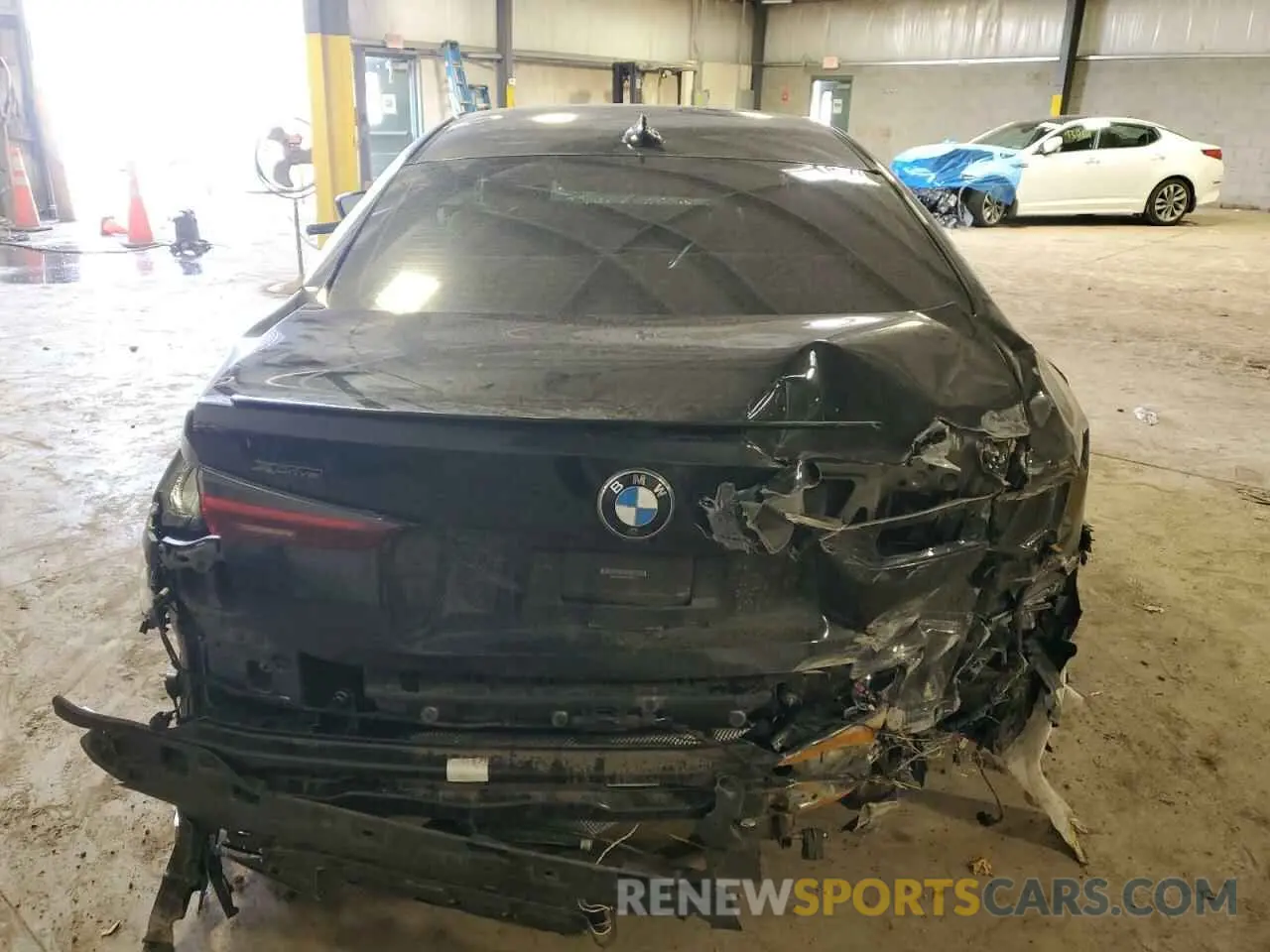 6 Photograph of a damaged car WBA13AR02MCH23714 BMW M4 2021