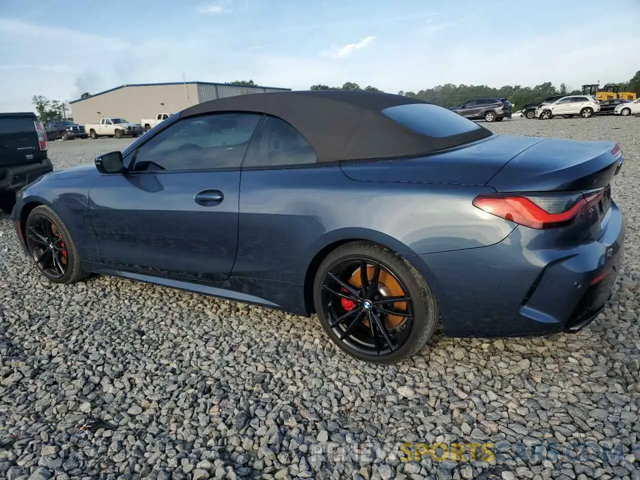 2 Photograph of a damaged car WBA63AT09NCJ54938 BMW M4 2022