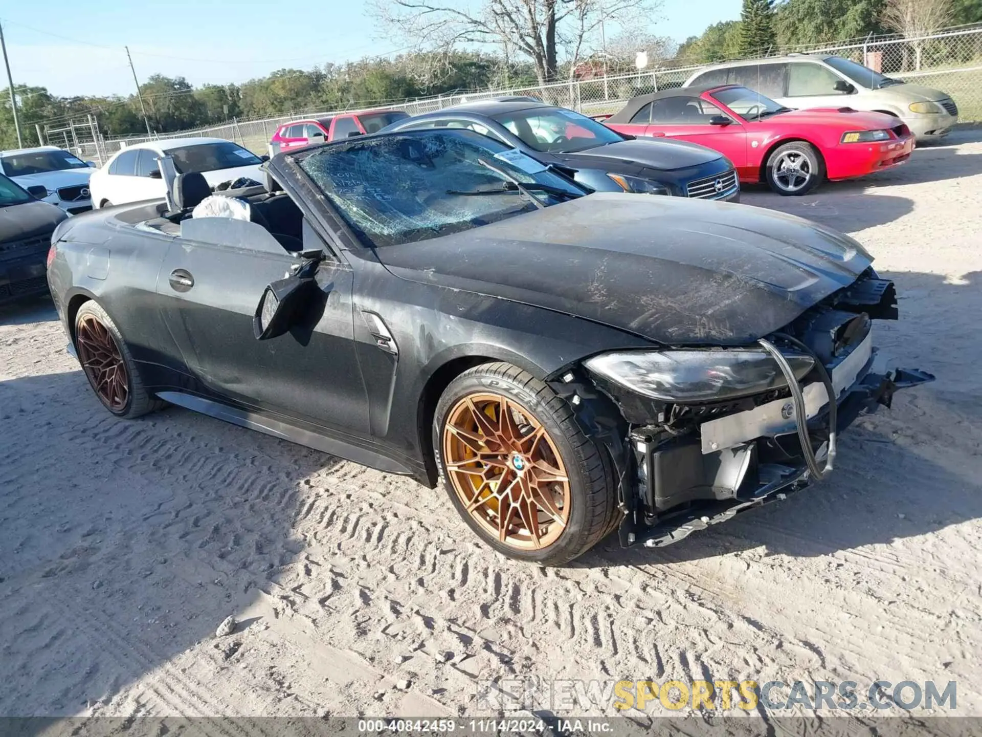 1 Photograph of a damaged car WBS33BA04NCJ13253 BMW M4 2022