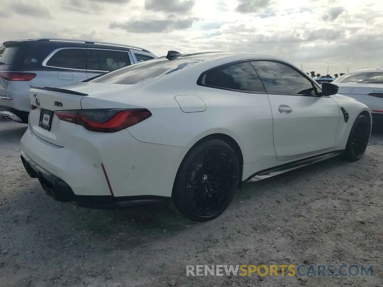 3 Фотография поврежденного автомобиля WBS43AZ02NCJ02450 BMW M4 2022