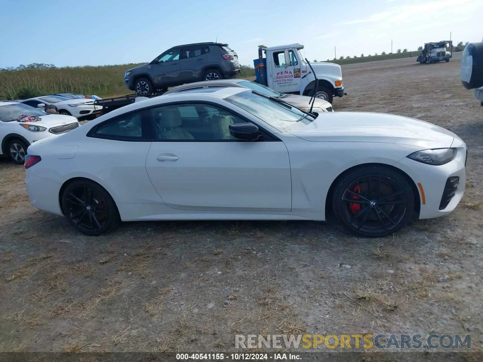 13 Photograph of a damaged car WBA83AP05NCK25006 BMW M440I 2022