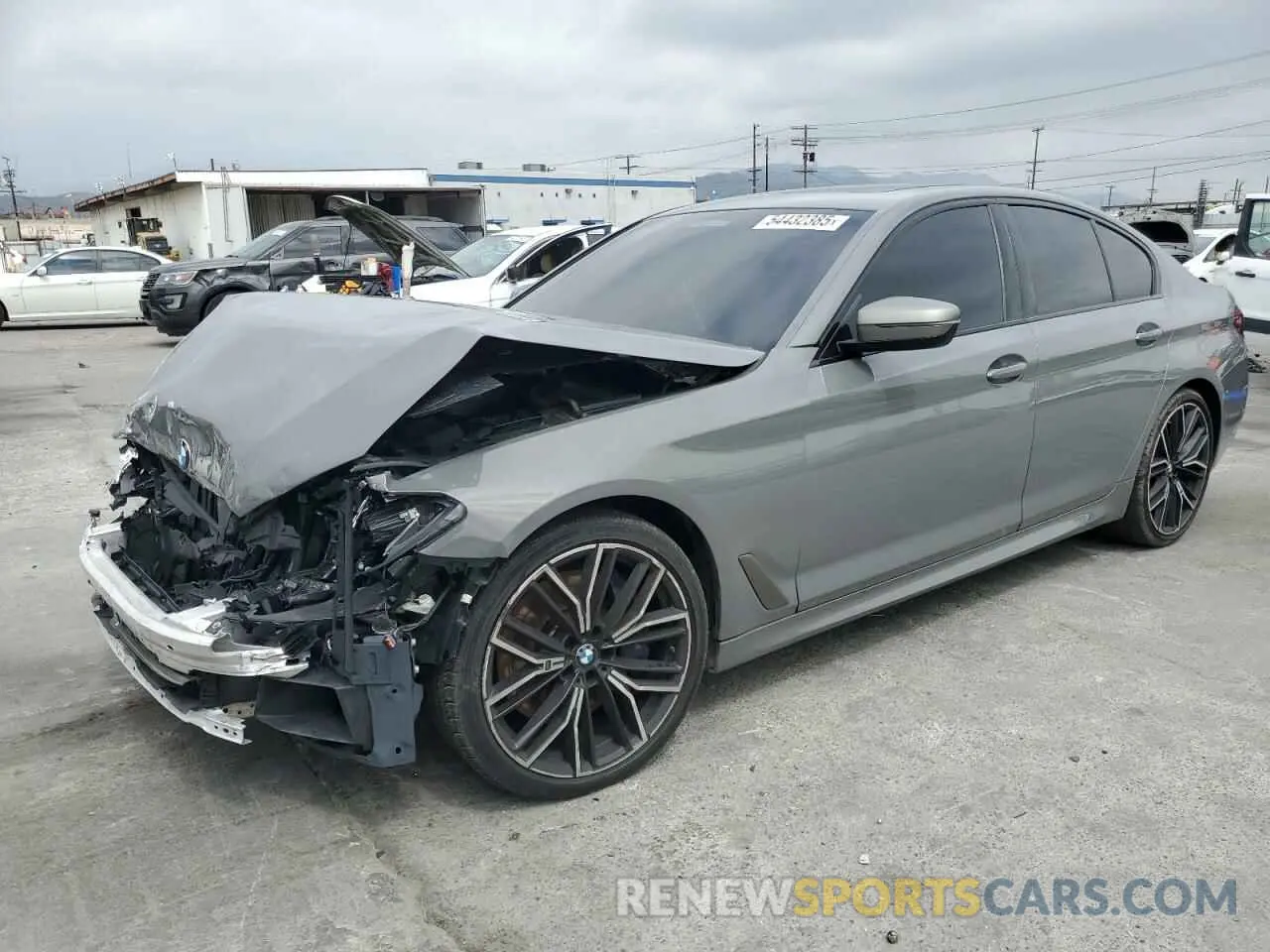 1 Photograph of a damaged car WBA13BK08NCJ34424 BMW M5 2022