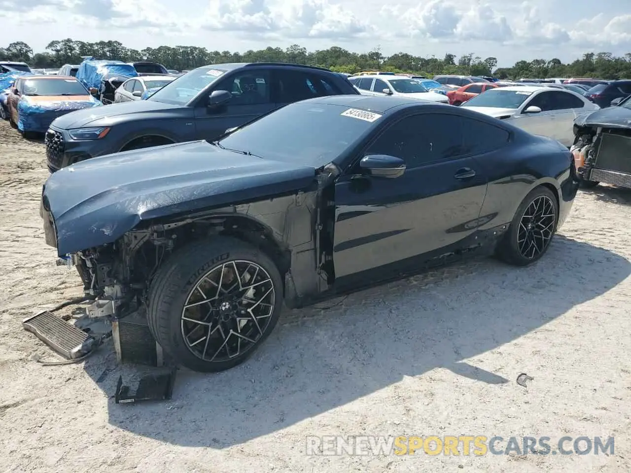 1 Photograph of a damaged car WBSAE0C03LBM08365 BMW M8 2020
