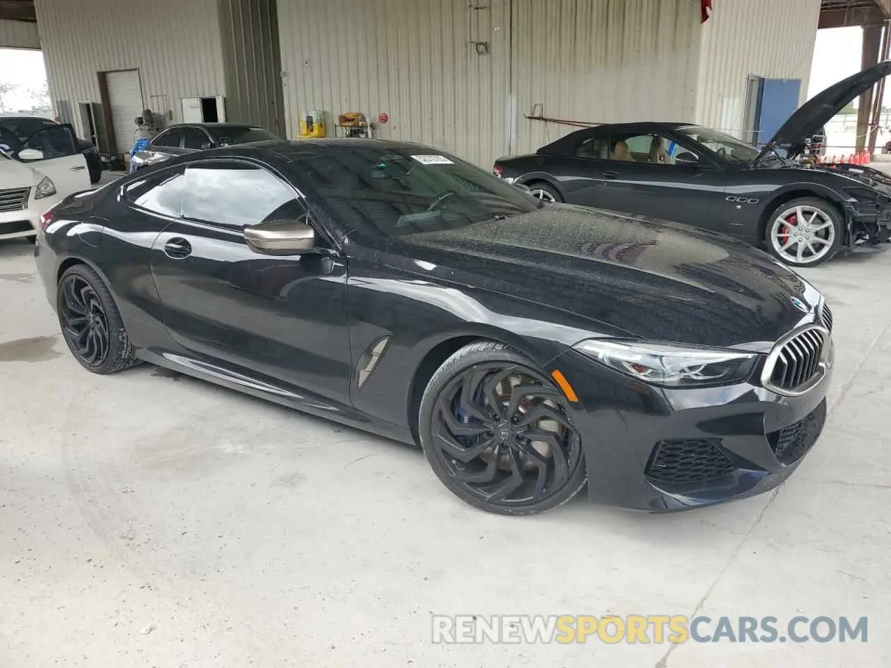 4 Photograph of a damaged car WBABC4C0XMCG35539 BMW M8 2021