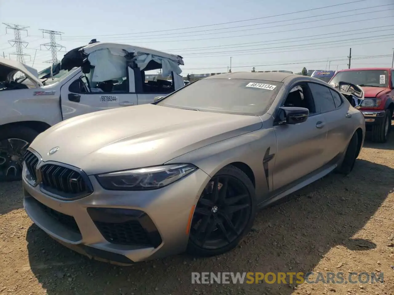 1 Photograph of a damaged car WBSGV0C01MCF26925 BMW M8 2021